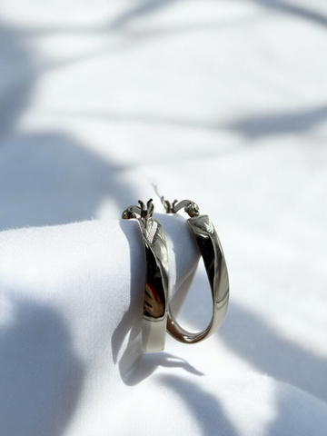 Sleek 925 silver hoop earrings, ideal for a timeless, chic look.