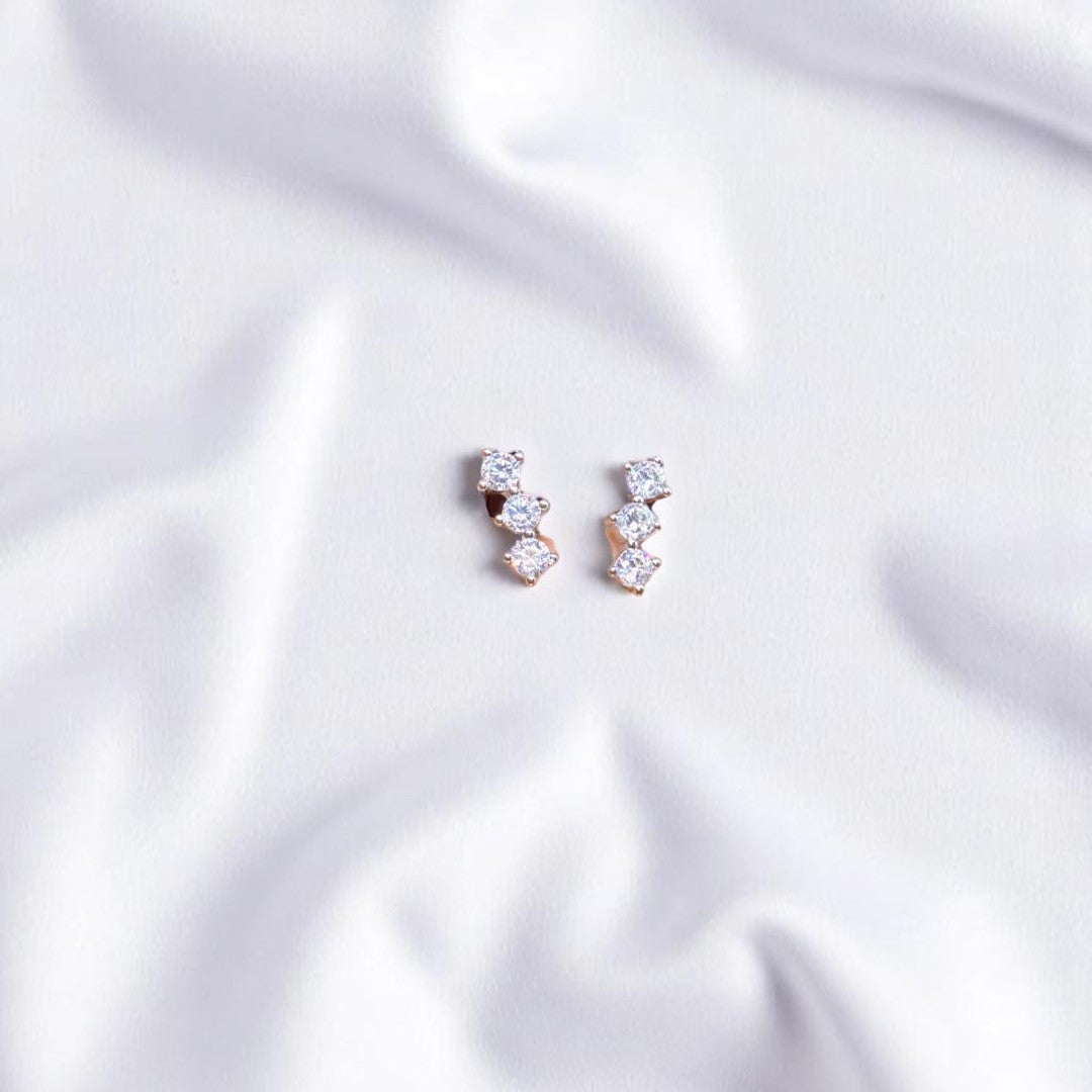 Classic 925 silver stud earrings with sparkling zircon stones for everyday elegance.