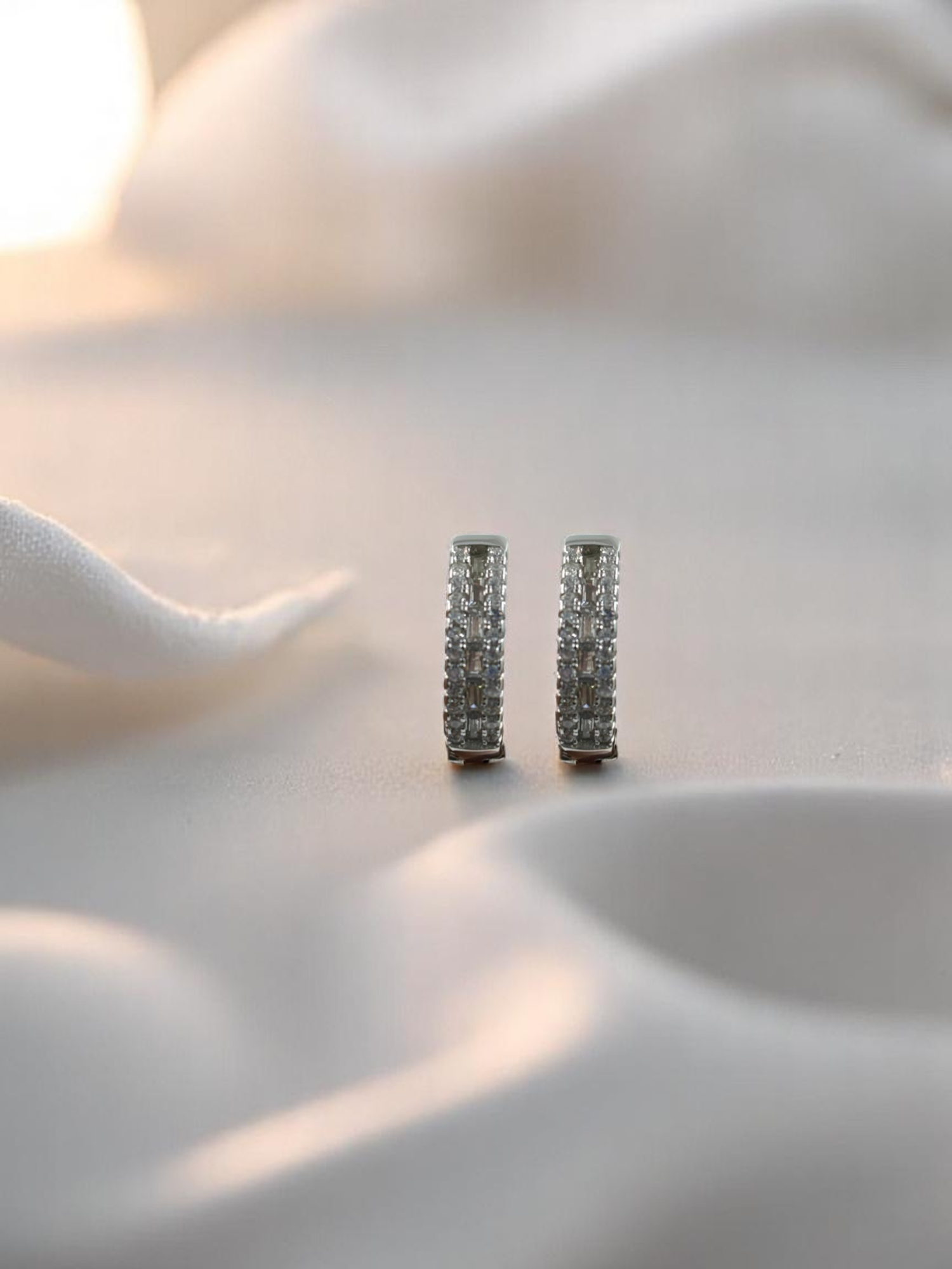 Sleek 925 silver hoop earrings, ideal for a timeless, chic look.