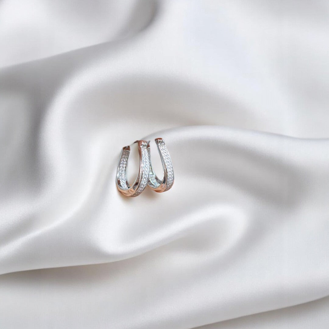 Sleek 925 silver hoop earrings, ideal for a timeless, chic look.