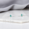 Vibrant 925 silver earrings with a bold green stone for a fresh and stylish look.
