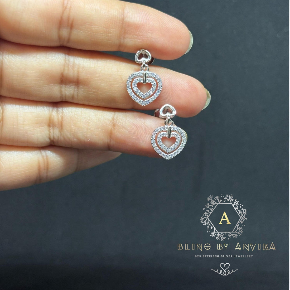 Minimalistic 925 silver earrings offering a clean and timeless design.