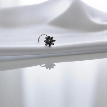 925 silver flower nose pin, designed with a lovely floral shape for a feminine and charming appearance.