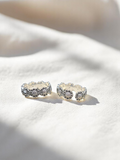 Beautiful 925 silver oxidized flower toe rings, featuring intricate floral patterns for a unique and trendy look.