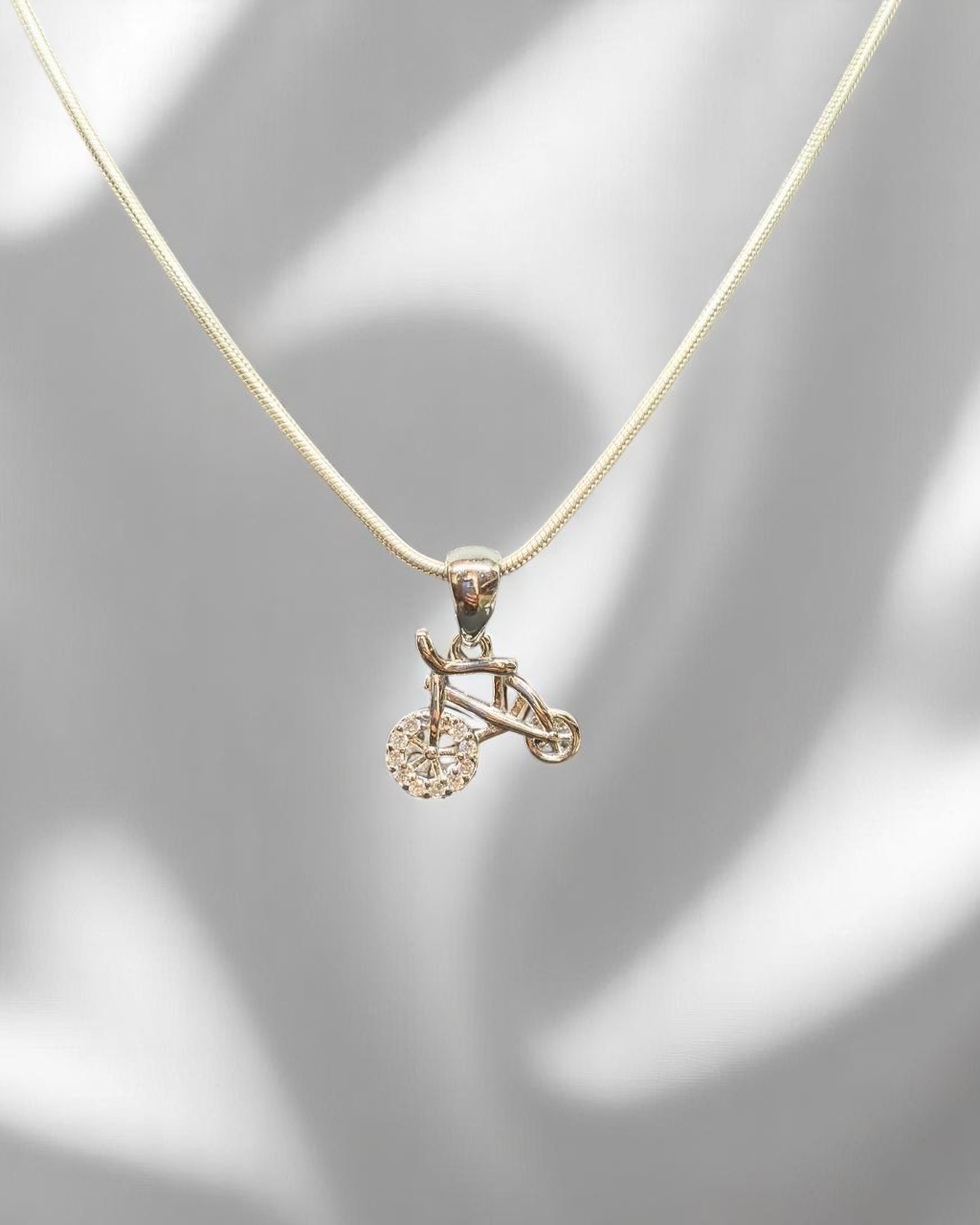 925 silver cycle pendant, featuring a cute and detailed bicycle design for a fun and sporty touch.