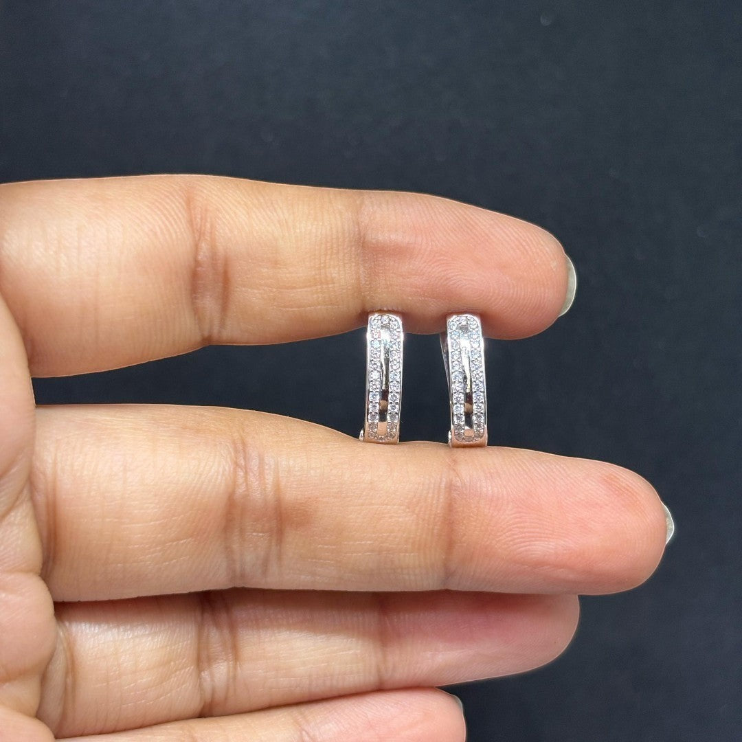 Sleek 925 silver hoop earrings, ideal for a timeless, chic look.