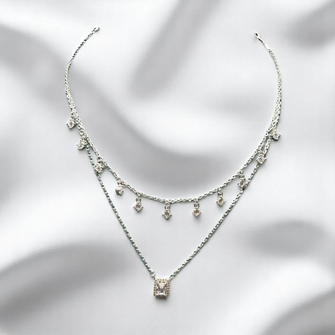 Stylish 925 silver necklace and earring set, crafted to create a harmonious look for any event.