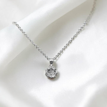 BlingbyAnvika sterling silver necklace with a sparkling cubic zirconia solitaire pendant. Delicate chain, timeless design.