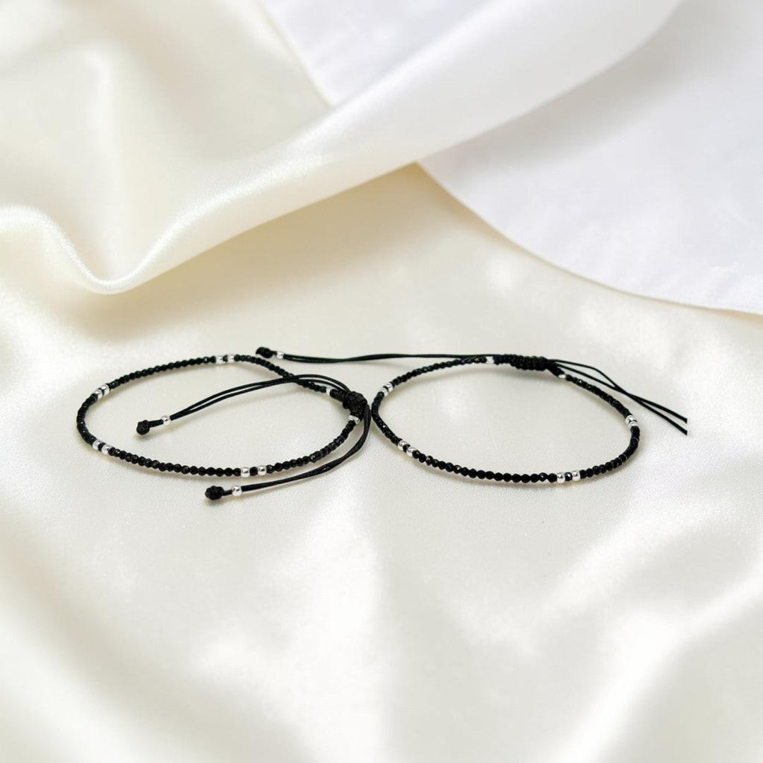BlingbyAnvika 925 sterling silver black thread Nazarband anklet with evil eye protection design.