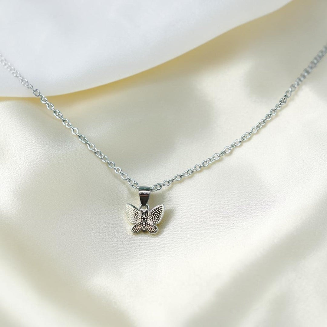 BlingbyAnvika 925 Sterling Silver Delicate Butterfly Pendant with textured wings.