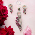 BlingbyAnvika 925 sterling silver earring and pendant set with intricate leaf design and pink stones.