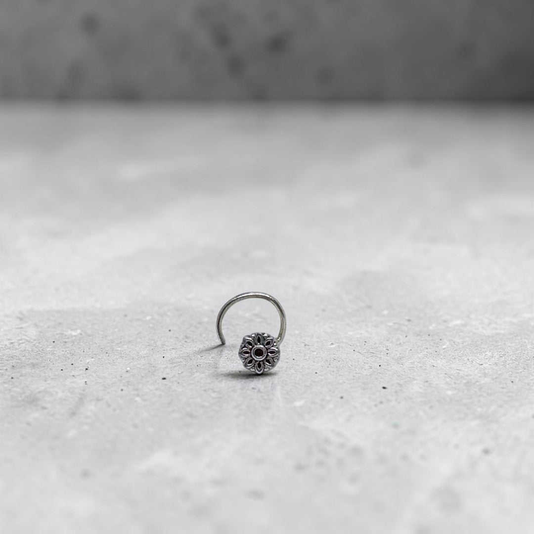 BlingbyAnvika 925 sterling silver nose pin featuring a delicate floral design for a feminine and elegant look.