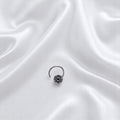 BlingbyAnvika 925 sterling silver nose pin featuring a delicate floral design for a feminine and elegant look.
