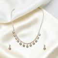 BlingbyAnvika elegant 925 sterling silver necklace and earrings set with diamond-shaped pendants.
