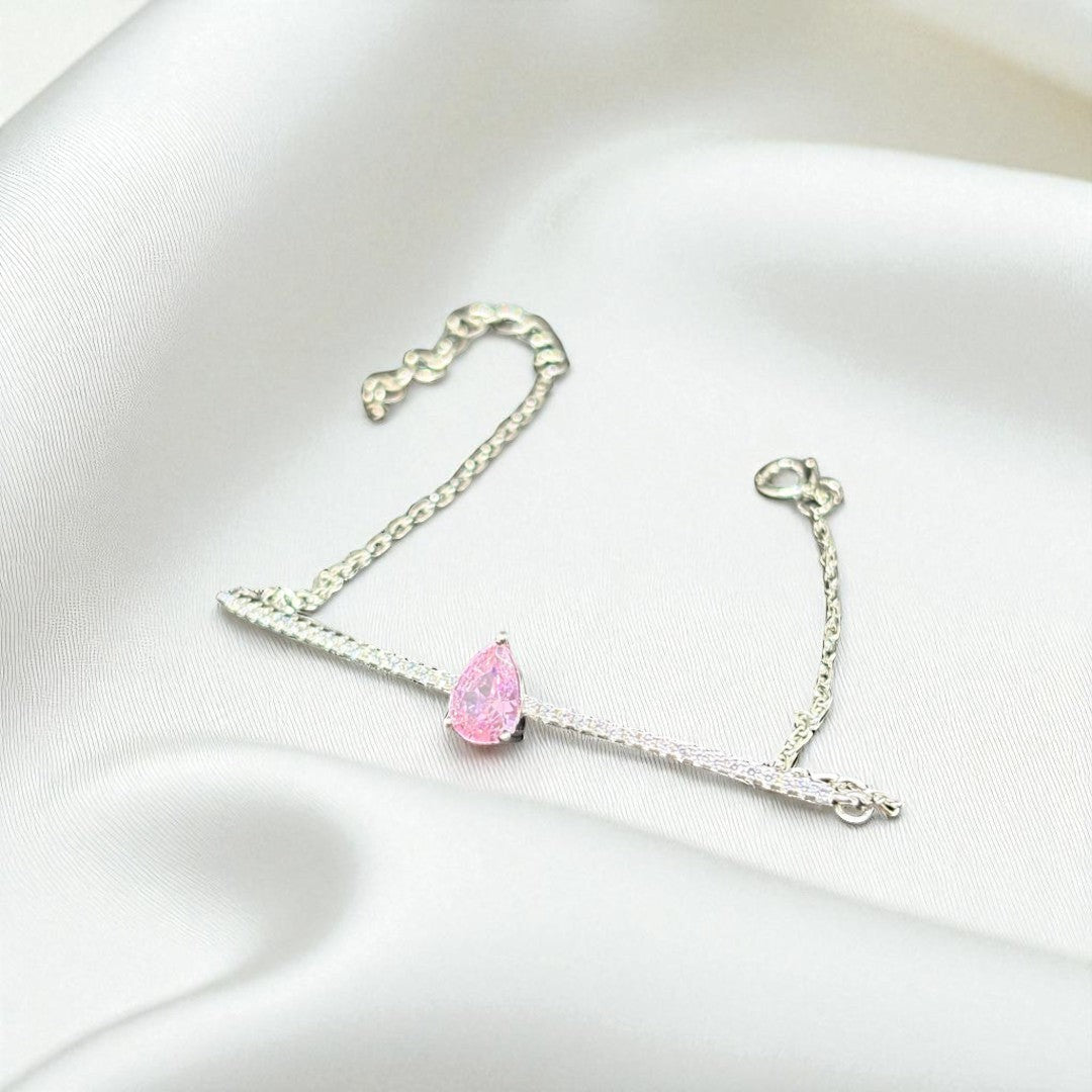 BlingbyAnvika 925 sterling silver bracelet featuring a delicate pink pear-cut stone on a shimmering chain.