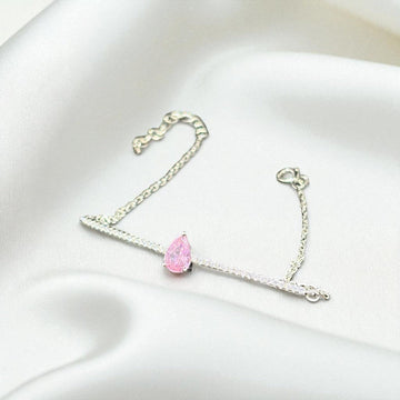 BlingbyAnvika 925 sterling silver bracelet featuring a delicate pink pear-cut stone on a shimmering chain.