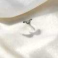 BlingbyAnvika 925 Sterling Silver Ring with sparkling stones in a circular setting, vintage charm.