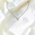 BlingbyAnvika 925 sterling silver necklace featuring a delicate chain and a single brilliant solitaire stone.