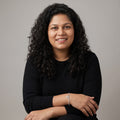 A woman wearing a delicate BlingbyAnvika 925 sterling silver stone bracelet on her wrist against a neutral background.