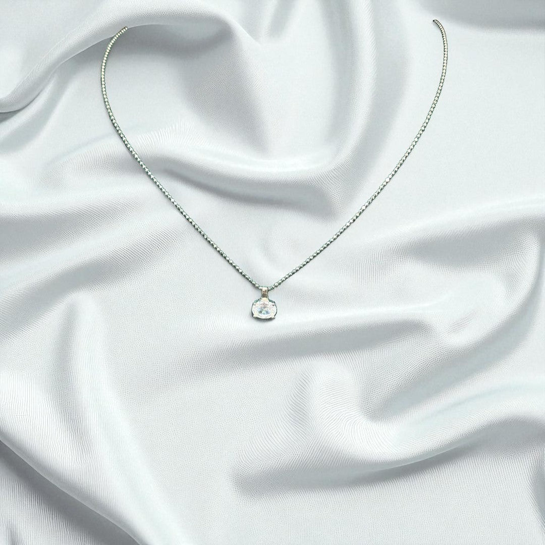 BlingbyAnvika 925 sterling silver necklace with a single clear stone pendant. Delicate chain, minimalist design.