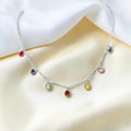 BlingbyAnvika sterling silver necklace with colorful teardrop cubic zirconia gems. Delicate chain, playful elegance.