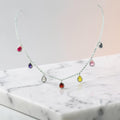 BlingbyAnvika sterling silver necklace with colorful teardrop cubic zirconia gems. Delicate chain, playful elegance.