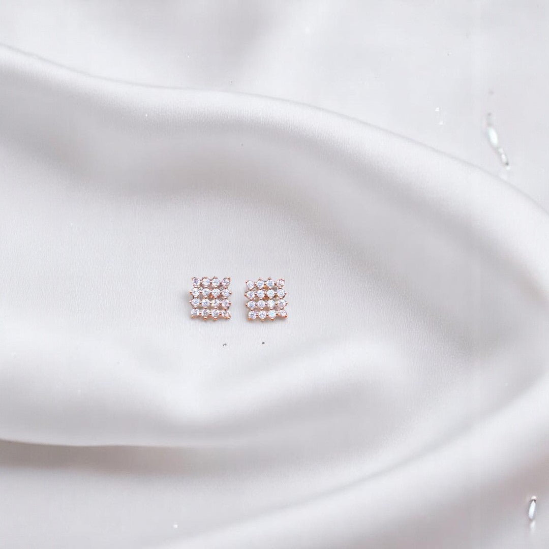 BlingbyAnvika rose gold plated sterling silver square stud earrings with clear zircon stones.