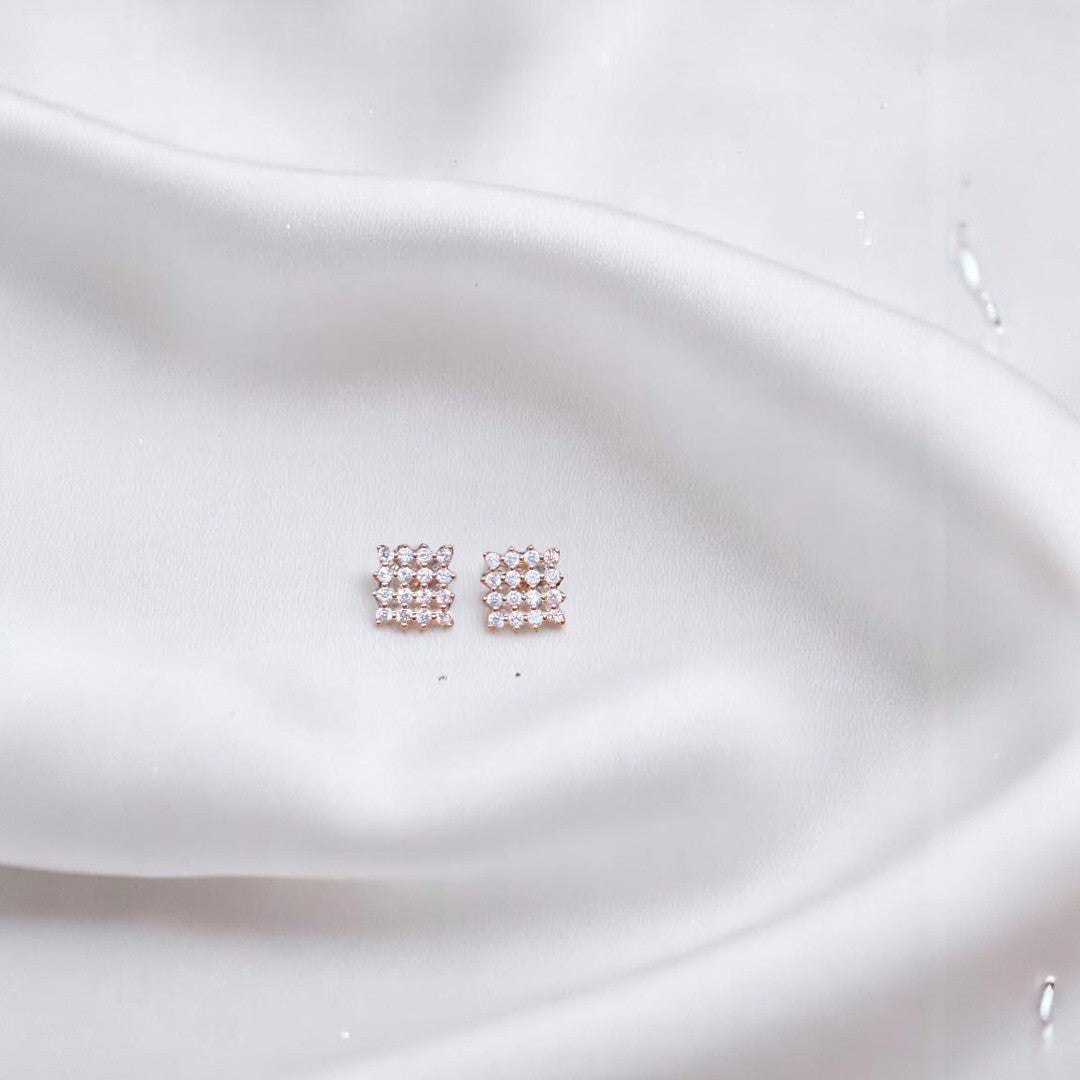 BlingbyAnvika rose gold plated sterling silver square stud earrings with clear zircon stones.