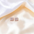 BlingbyAnvika rose gold plated sterling silver square stud earrings with clear zircon stones.