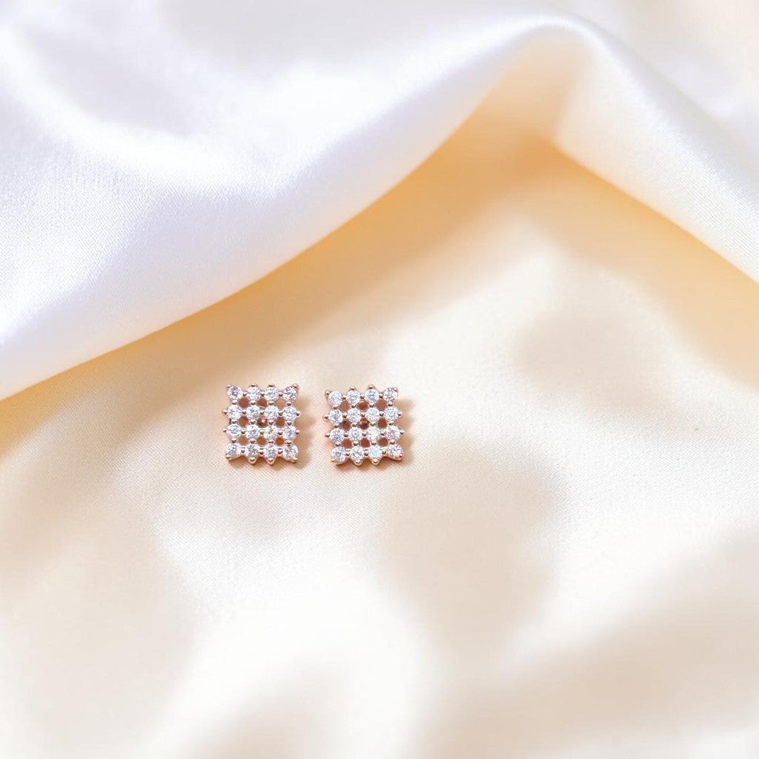 BlingbyAnvika rose gold plated sterling silver square stud earrings with clear zircon stones.