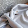 BlingbyAnvika 925 sterling silver triangle stud earrings with black stone.