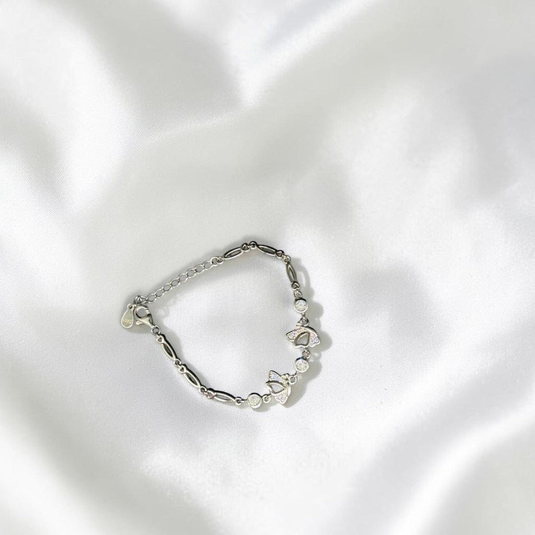 BlingbyAnvika 925 sterling silver bracelet with butterfly charms and cubic zirconia stones, adjustable.