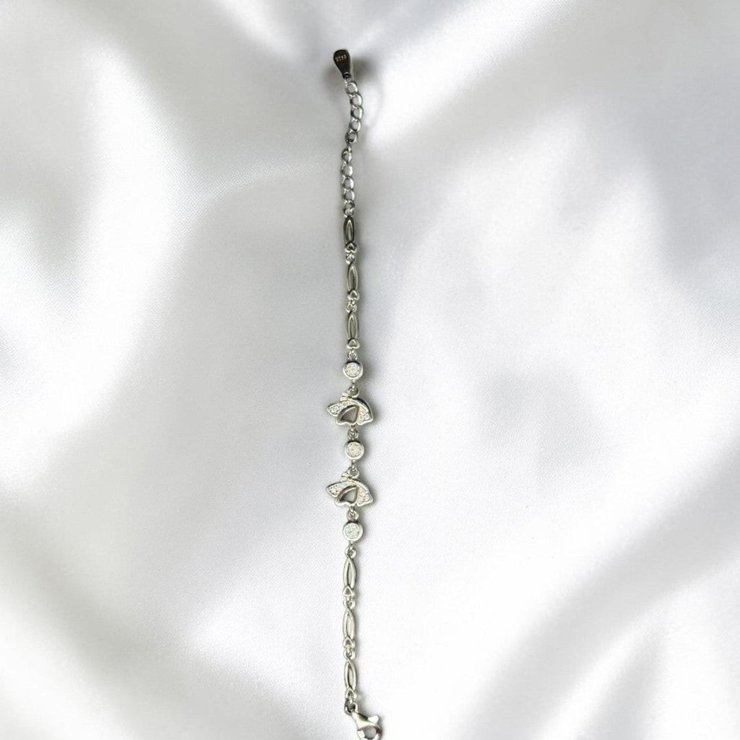 BlingbyAnvika 925 sterling silver bracelet with butterfly charms and cubic zirconia accents, adjustable.