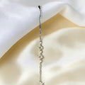 BlingbyAnvika 925 Sterling Silver bracelet with butterfly charms and cubic zirconia accents. Adjustable.