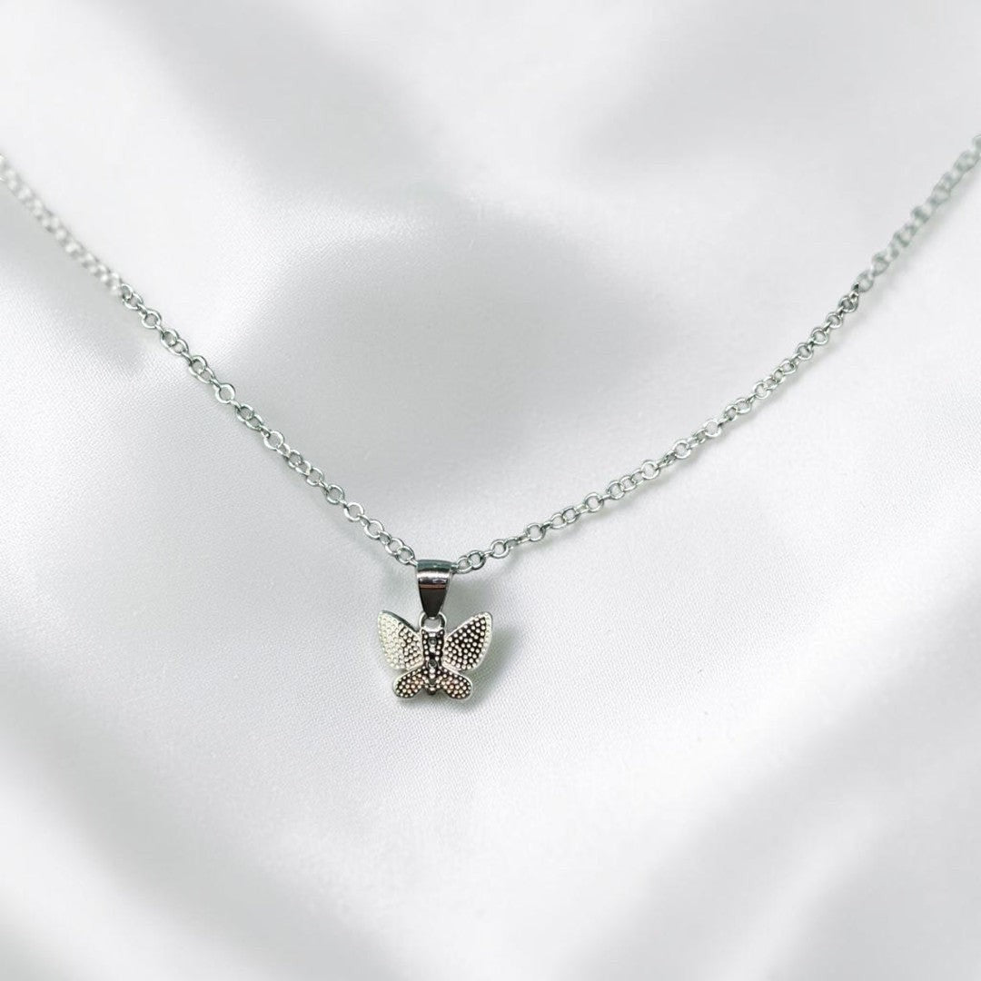 BlingbyAnvika delicate silver-tone butterfly pendant. Perfect for everyday wear.