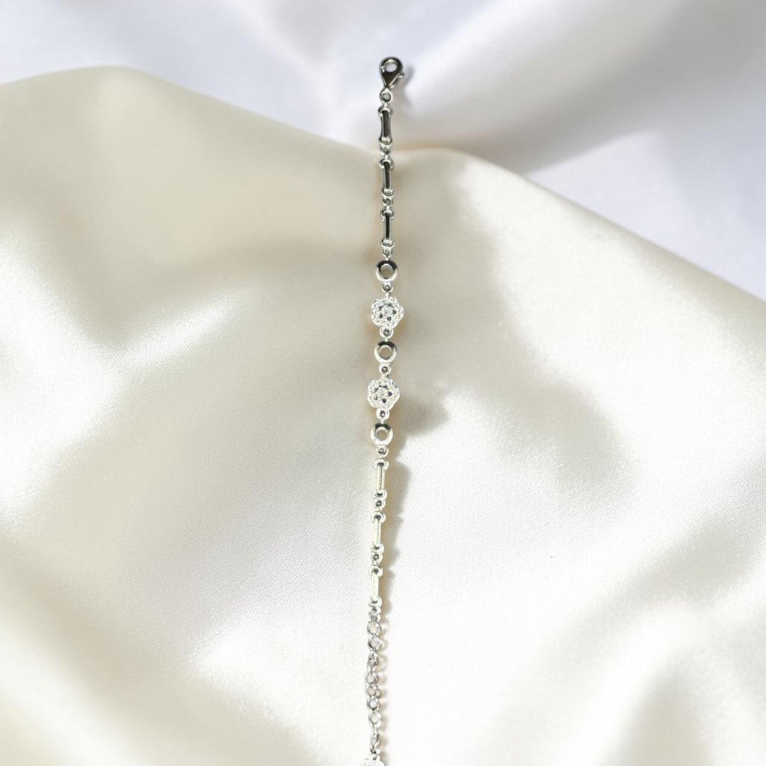 BlingbyAnvika 925 Sterling Silver Chain Bracelet with cubic zirconia accents and polished beads. Elegant, delicate, and sophisticated.
