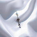 BlingbyAnvika 925 Sterling Silver bracelet with colorful beads and charms, delicate chain, elegant design.