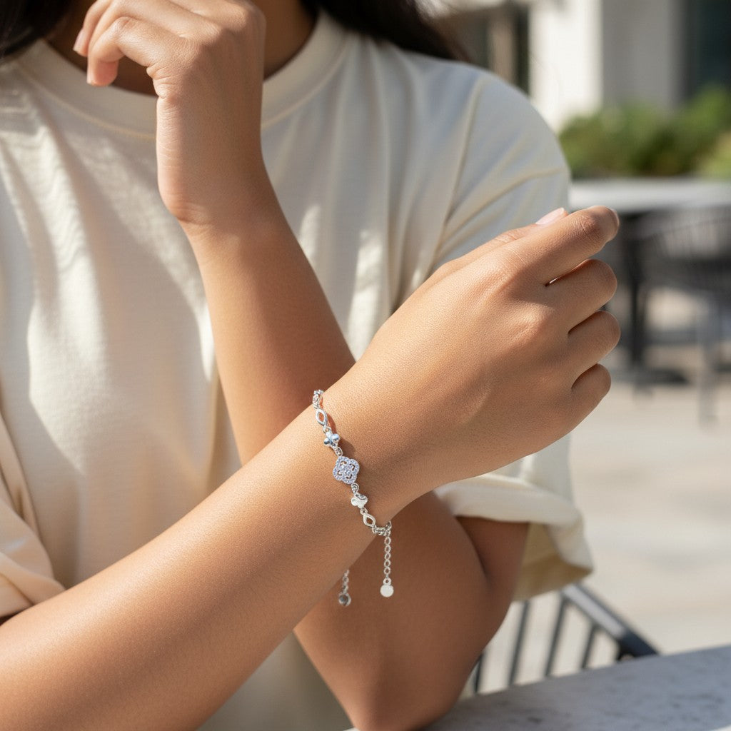 BlingbyAnvika 925 Sterling Silver bracelet with floral charm and cubic zirconia, delicate chain, heart charm.