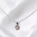 BlingbyAnvika sterling silver necklace with a four-leaf clover pendant featuring heart-shaped petals and cubic zirconia.
