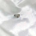 BlingbyAnvika delicate silver-tone ring with clover motif, adjustable metal band, minimalist design.