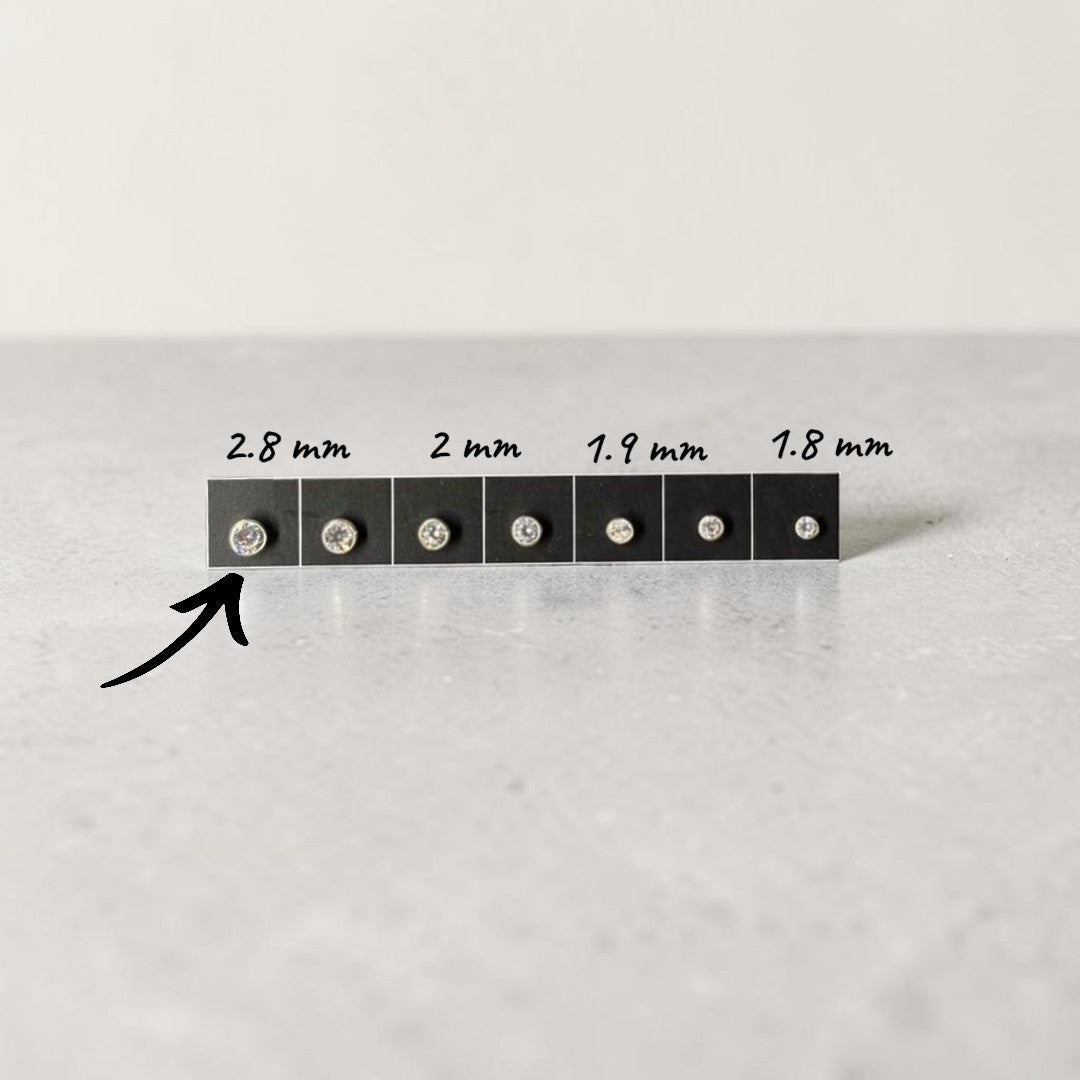 BlingbyAnvika 925 Sterling Silver stud nosepins with clear cubic zirconia stones in various sizes.