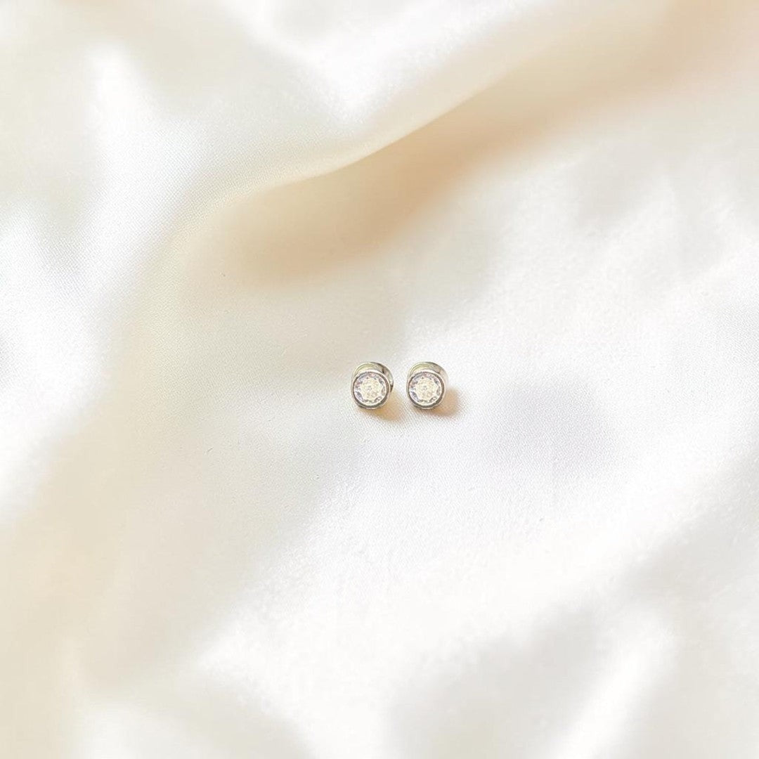 BlingbyAnvika classic sterling silver stud earrings with cubic zirconia stones, perfect for everyday wear.