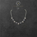 Bling by Anvika sterling silver short necklace with horseshoe and evil eye charms.