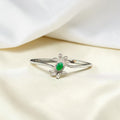 BlingbyAnvika 925 sterling silver floral bangle bracelet with green gemstone and cubic zirconia accents.