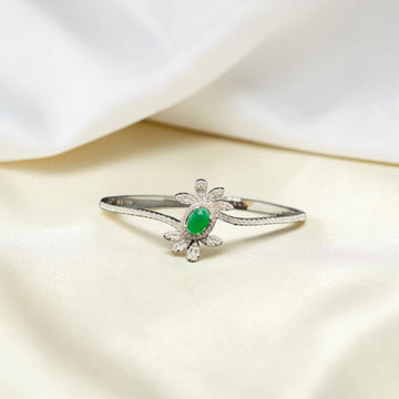 BlingbyAnvika 925 sterling silver floral bangle bracelet with green gemstone and cubic zirconia accents.