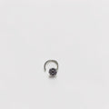 BlingbyAnvika 925 sterling silver nose pin featuring a delicate floral design on a white satin background.
