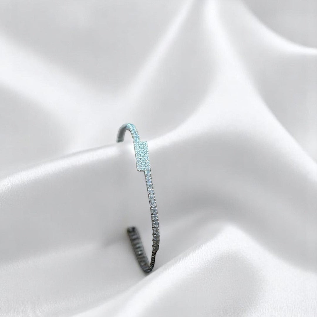 BlingbyAnvika 925 silver cuff bracelet with geometric design and sparkling stones, adjustable open cuff.