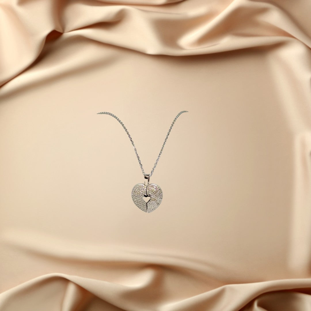 BlingbyAnvika 925 Sterling Silver split heart necklace with cubic zirconia stones and a delicate silver chain.