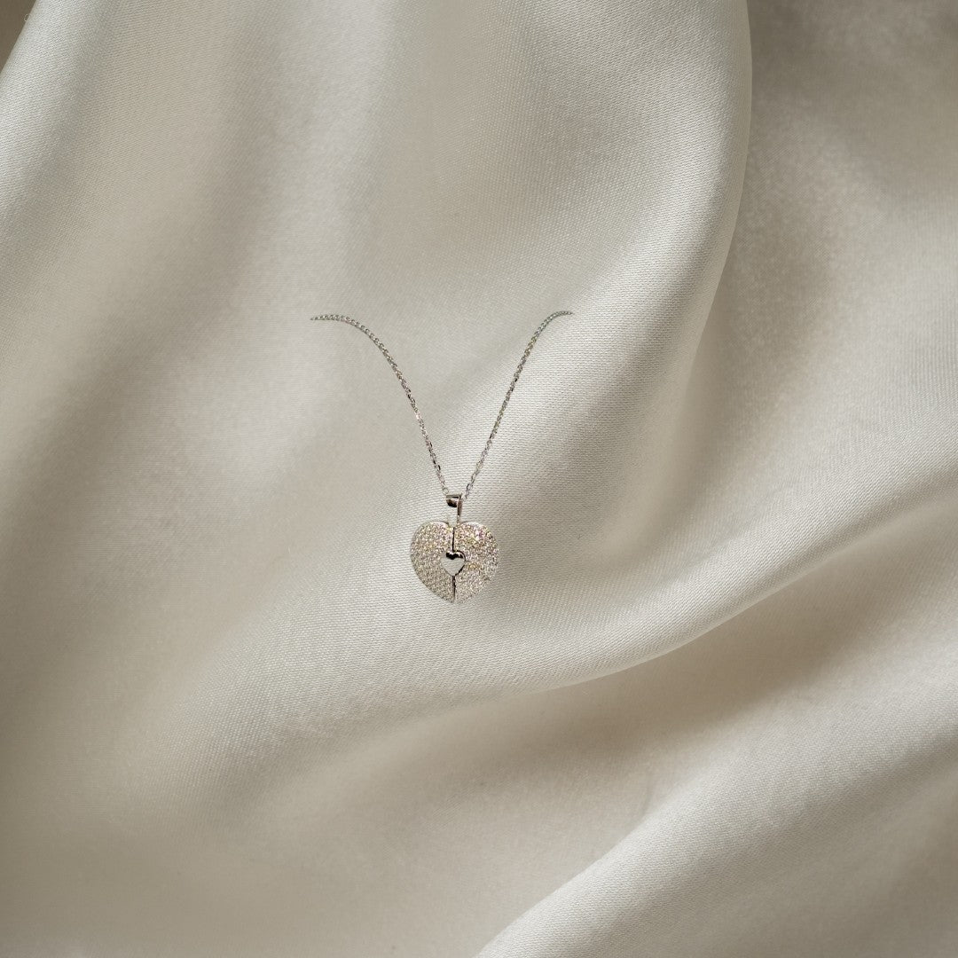 BlingbyAnvika 925 sterling silver split heart necklace with cubic zirconia stones on a delicate chain.