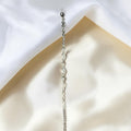 BlingbyAnvika 925 Sterling Silver bracelet with alternating infinity symbols and cubic zirconia stones.